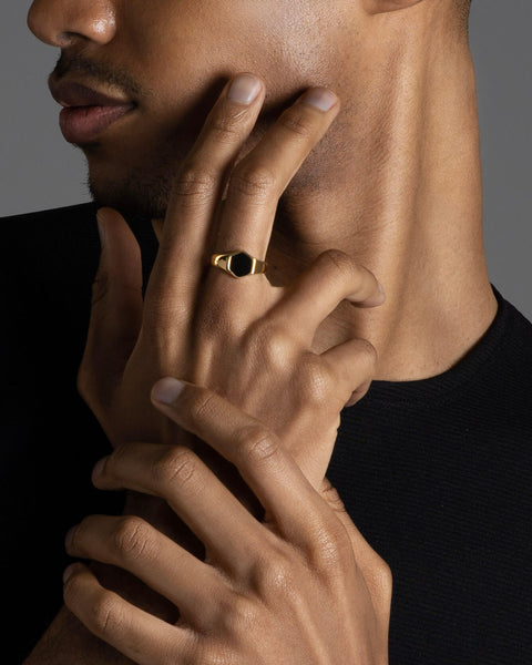 Bedok men's ring by Five Jwlry, featuring a signet style with a black flat hexagon top. Available in 14k gold or silver, crafted from water-resistant 316L stainless steel. Hypoallergenic with a 2-year warranty.