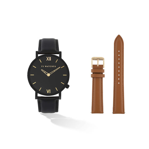 Discover the Oro moon set, a 36mm women's watch signed Five Jwlry with an all-black dial and gold hands. This one comes with a genuine black leather strap and a tan leather strap! The perfect gift!