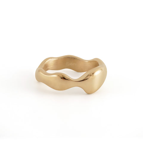 Dawn women's ring by Five Jwlry, a collaboration with Alicia Moffet, blending classic band style with the fluid elegance of a water droplet. Available in 14k gold or silver, this unique piece is crafted from water-resistant 316L stainless steel. Hypoallergenic with a 2-year warranty.