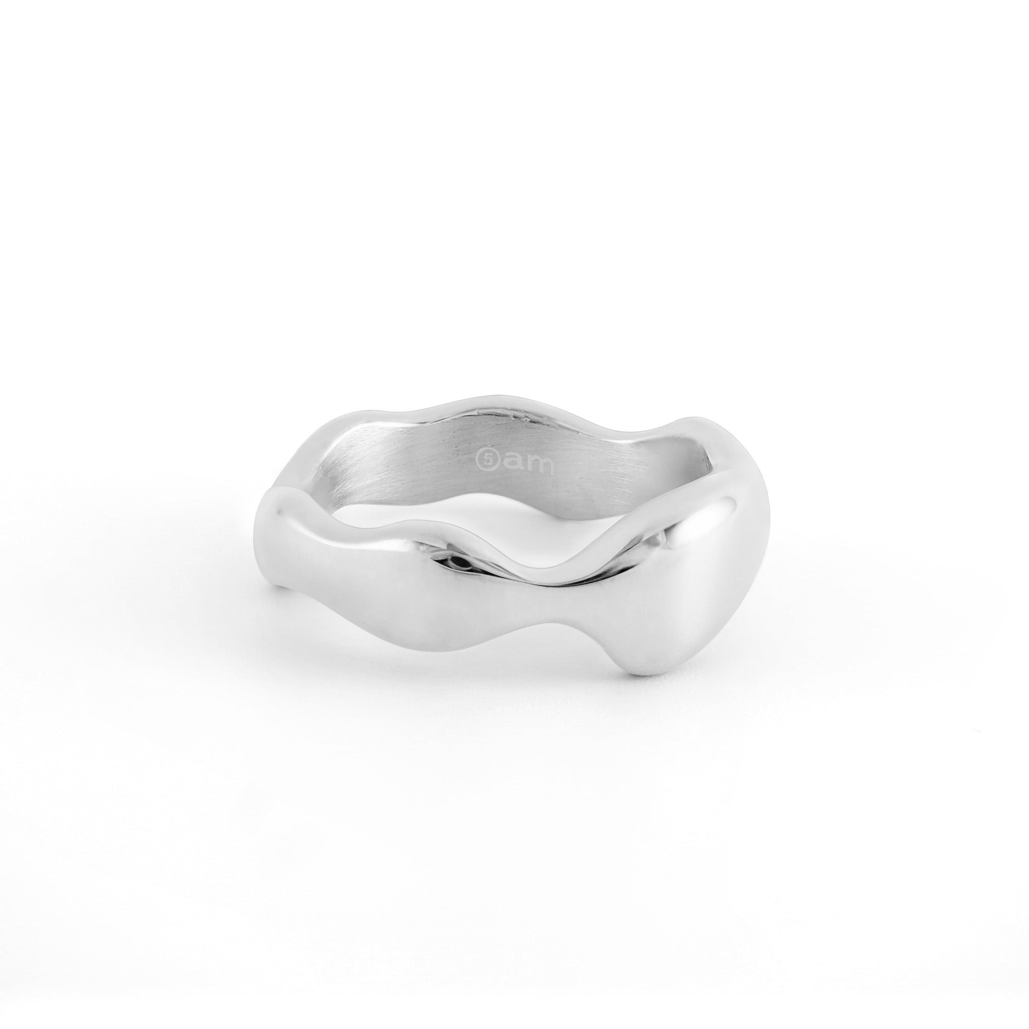 Dawn women's ring by Five Jwlry, a collaboration with Alicia Moffet, blending classic band style with the fluid elegance of a water droplet. Available in 14k gold or silver, this unique piece is crafted from water-resistant 316L stainless steel. Hypoallergenic with a 2-year warranty.