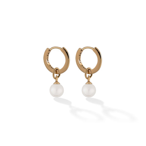 SOCA women's earring by Five Jwlry. A small, sleek 13mm hoop earring featuring a charm made from a small white pearl. Available in 14k gold or silver, crafted from water-resistant 316L stainless steel. Hypoallergenic with a 2-year warranty.