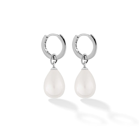 SOCA women's earring by Five Jwlry. Available in a refined 13mm size or a bolder 16mm, each featuring a removable natural white pearl hoop charm that can be switched out. Crafted in 14k gold or silver from water-resistant 316L stainless steel. Hypoallergenic with a 2-year warranty.