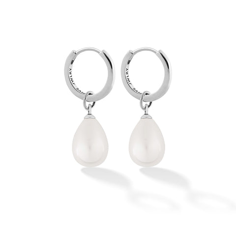 SOCA women's earring by Five Jwlry. Available in a refined 13mm size or a bolder 16mm, each featuring a removable natural white pearl hoop charm that can be switched out. Crafted in 14k gold or silver from water-resistant 316L stainless steel. Hypoallergenic with a 2-year warranty.