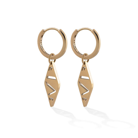 SOCA women's earring by Five Jwlry. Choose from a 13mm hoop or 16mm size, each complemented by the signature FIVE lozenge hoop charm. Customize with one or two pendants for versatile, interchangeable adornments. SOCA represents the fusion of elegance and personalization. Available in 14k gold or silver, made from water-resistant 316L stainless steel. Hypoallergenic with a 2-year warranty.