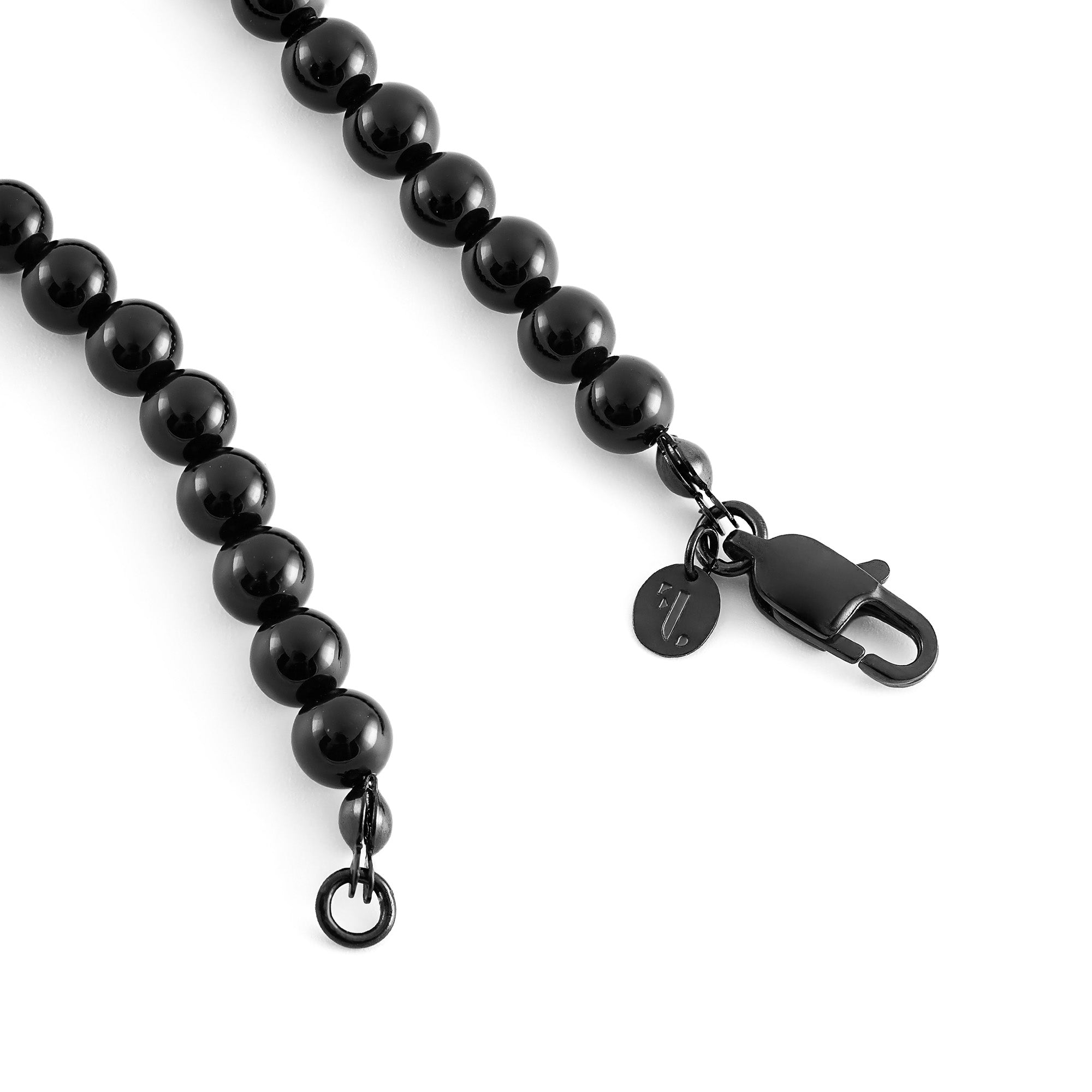 Dark Var women's bracelet by Five Jwlry, crafted with black onyx beads and a black stainless steel buckle. Available in sizes 17cm and 20cm. Made from water-resistant 316L stainless steel. Hypoallergenic with a 2-year warranty.