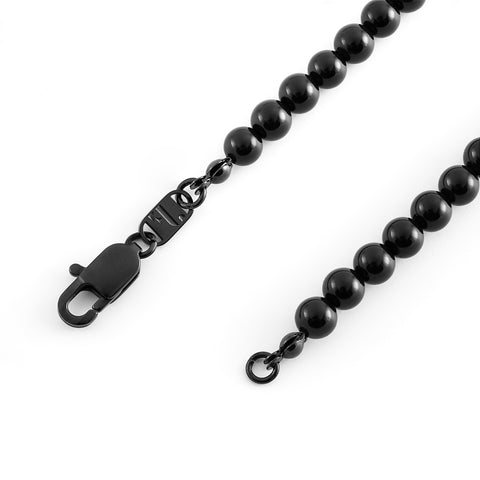 Dark Var men's necklace by Five Jwlry, designed with black onyx stone pearls complemented by a black stainless steel buckle. Available in sizes 45cm and 50cm. Crafted from water-resistant 316L stainless steel. Hypoallergenic with a 2-year warranty.