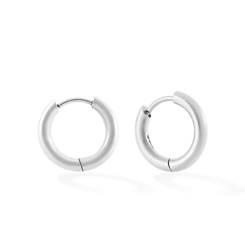 Dawn women's hoop earring by Five Jwlry, a refined piece from Alicia Moffet's collaboration, featuring the singular ring from the brand's pendant earring, now presented solo for understated elegance. Available in 14k gold or silver, crafted from water-resistant 316L stainless steel. Hypoallergenic with a 2-year warranty.