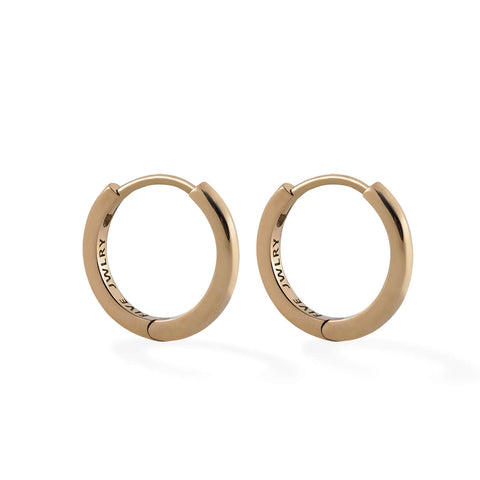 SOCA women's earring by Five Jwlry. Minimalist hoops available in two sizes, 13mm or 16mm, designed for women. Choose from 14k gold or silver, crafted from water-resistant 316L stainless steel. Hypoallergenic with a 2-year warranty.
