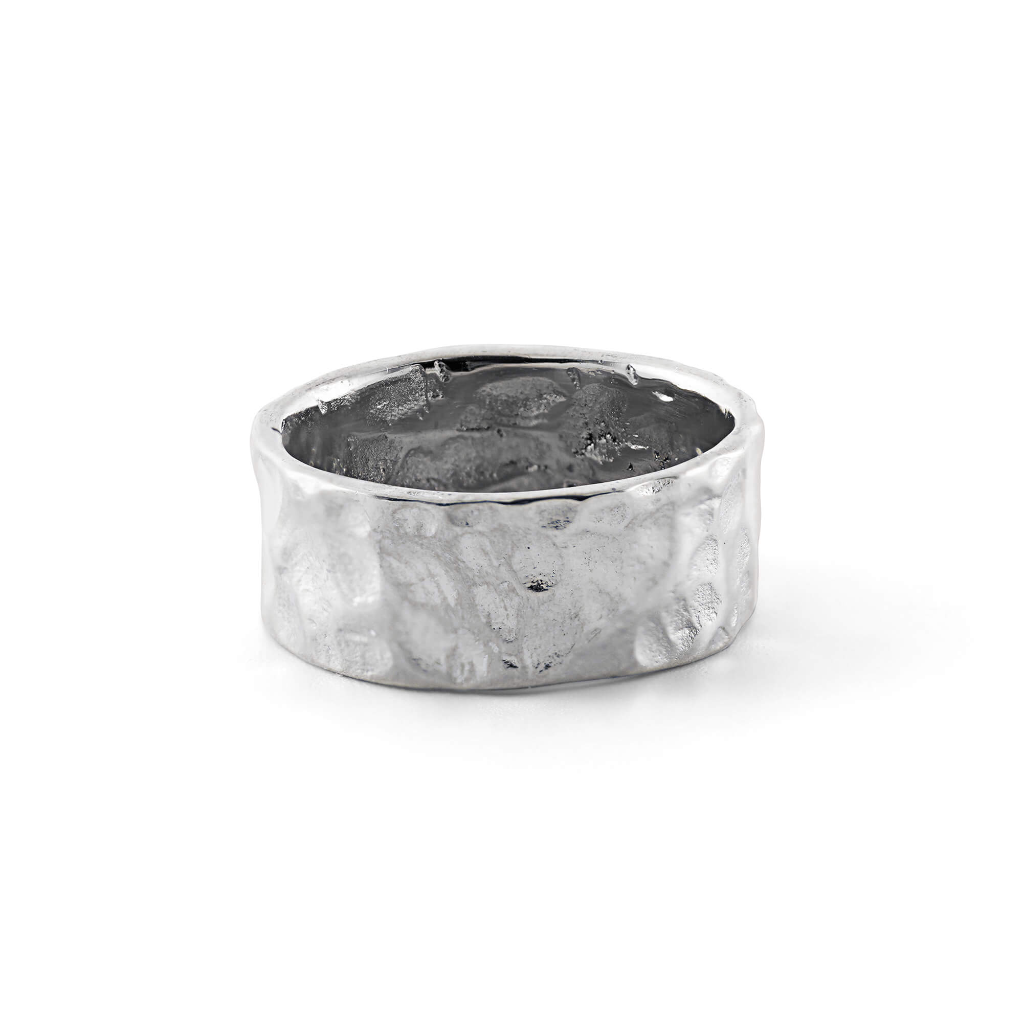 LUNE ring, designed in Montreal and made of waterproof and hypoallergenic stainless steel in silver color. Its unique design boasts delicate bumps, embodying a perfectly imperfect aesthetic inspired by the lunar landscape with its craters and golden reflections.