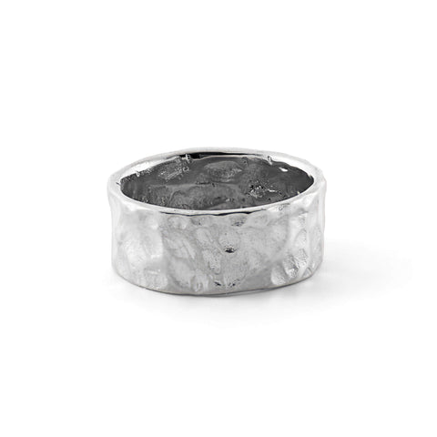 LUNE ring, designed in Montreal and made of waterproof and hypoallergenic stainless steel in silver color. Its unique design boasts delicate bumps, embodying a perfectly imperfect aesthetic inspired by the lunar landscape with its craters and golden reflections.