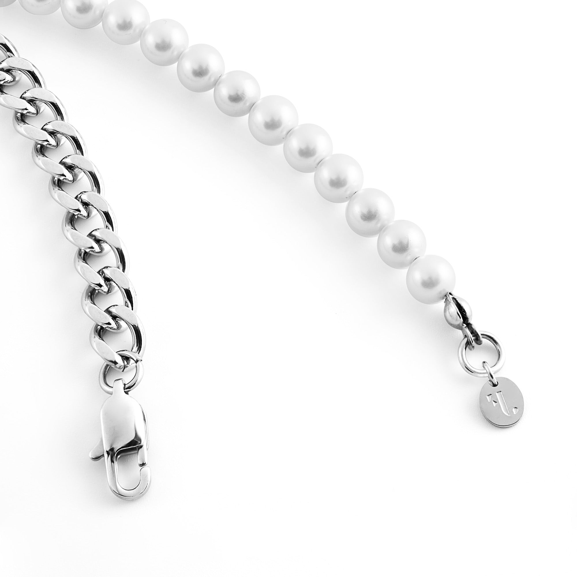 Volga women's bracelet by Five Jwlry, uniquely crafted with a combination of half silver Cuban chain and half white pearls, measuring 20cm or 23cm in length. Made from water-resistant 316L stainless steel. Hypoallergenic with a 2-year warranty.