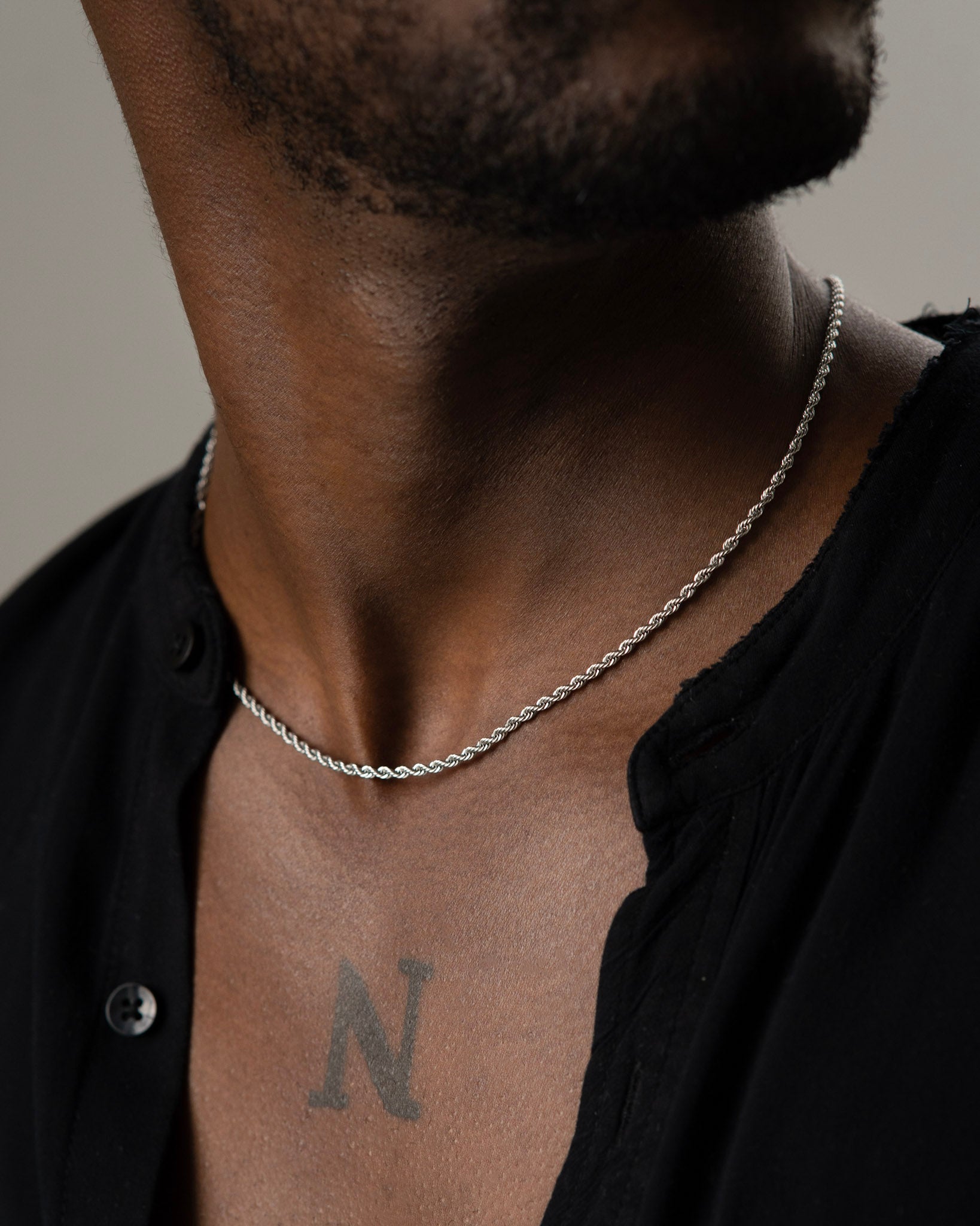 Baby Don men's necklace by Five Jwlry, crafted from a thin 2.5mm French rope twisted chain in silver-colored, water-resistant 316L stainless steel. Available in sizes 45cm, 50cm, and 55cm. Hypoallergenic with a 2-year warranty.