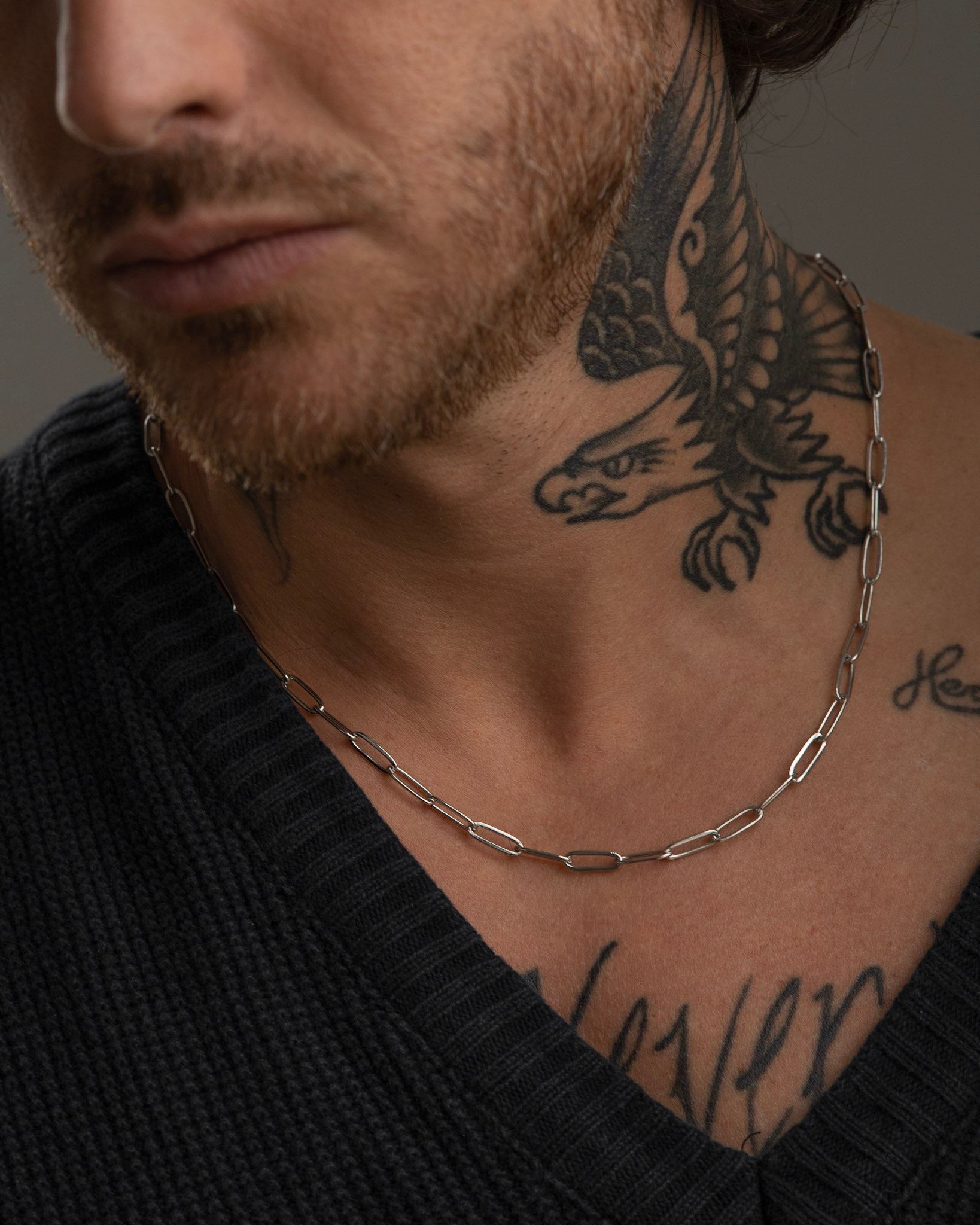 PRAZ men's necklace by Five Jwlry, crafted from a 5mm paperclip chain in silver-colored, water-resistant 316L stainless steel. Available in sizes 45cm, 50cm, and 55cm. Hypoallergenic with a 2-year warranty.