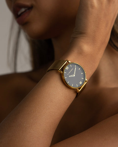 Discover Moonlight, a 36 mm women's watch from Five Jwlry with a black and gold dial. This one can be paired with a gold or black mesh bracelet!